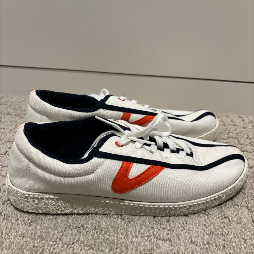 Tretorn White and Orange Athletic Shoes Sleek Minimalist Design